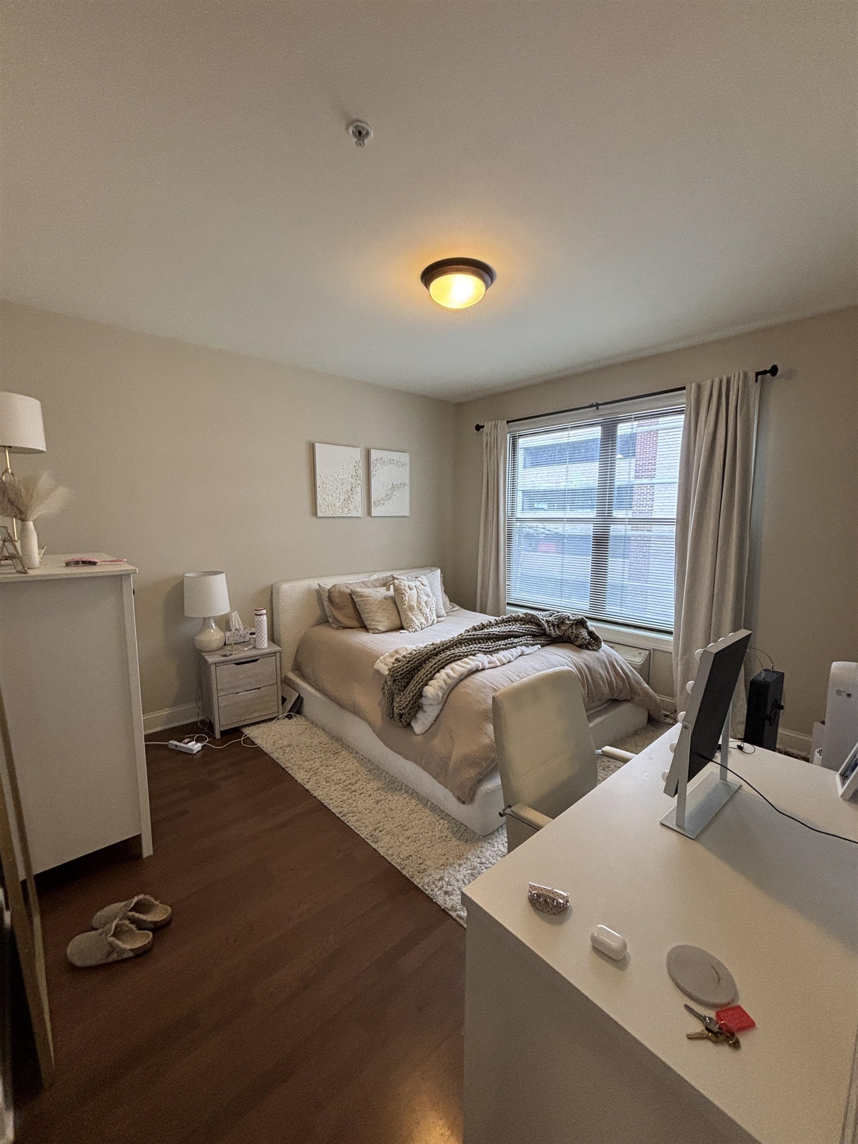 100 Marshall Street, Unit 316 Hoboken, NJ 07030 - Photo 6 of 9 a bedroom with a bed and a window