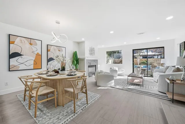 a view of a dining room with furniture window and outside view
