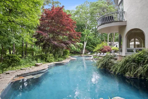 an outdoor view of garden with patio