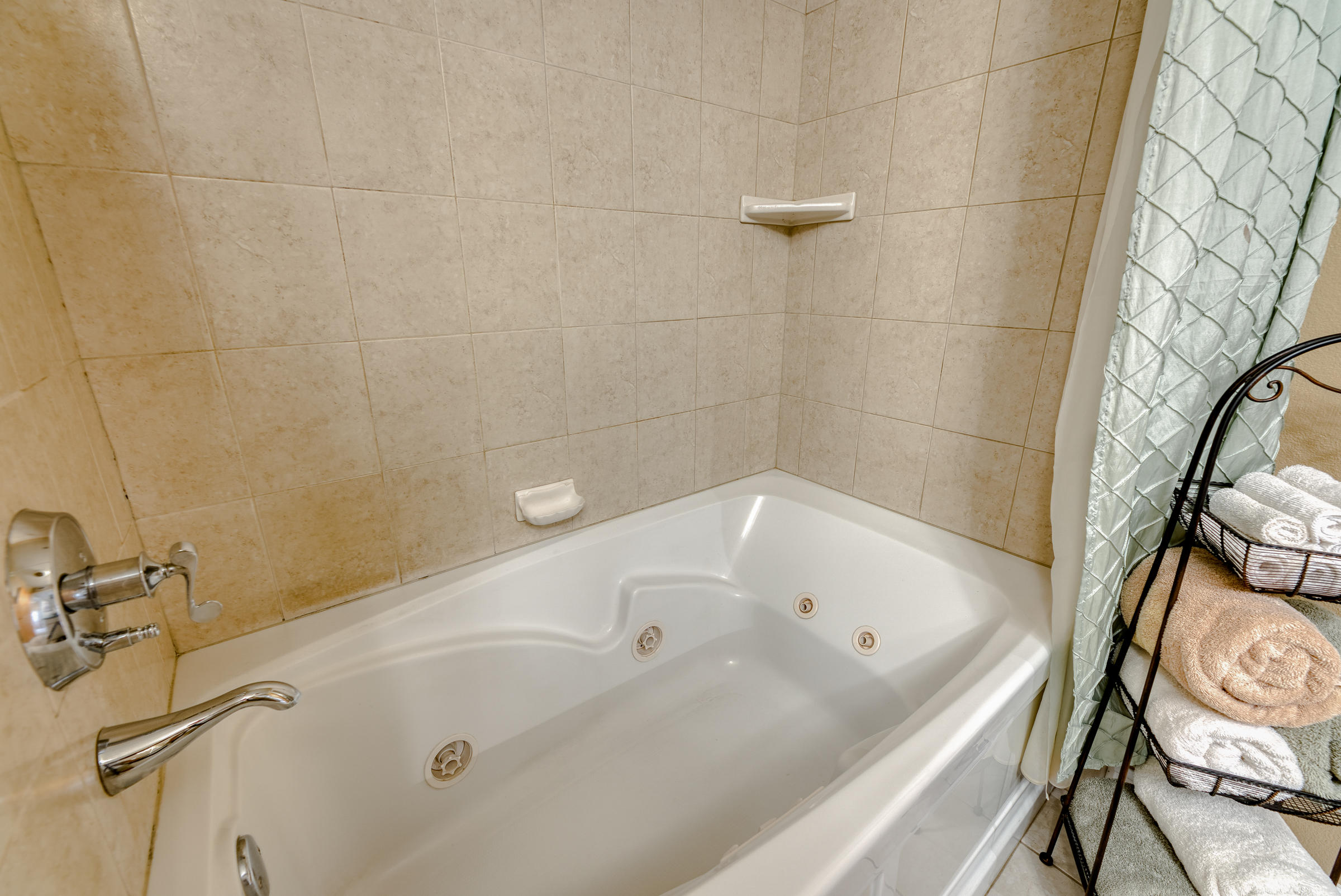 19970 Loafer Way Redding, CA 96002 - Photo 12 of 20 a bathroom with a tub and a shower