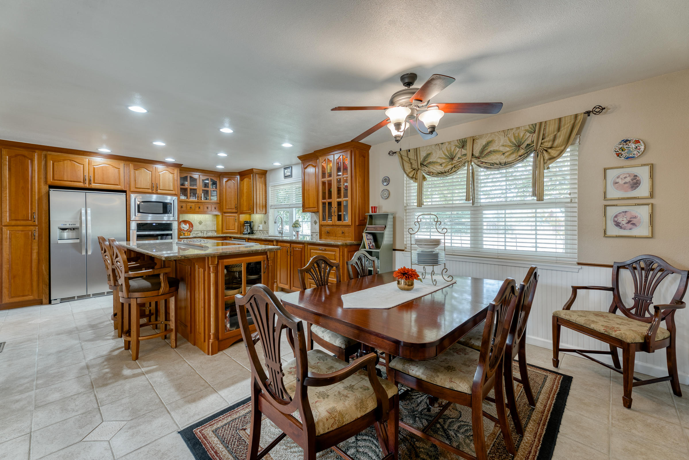19970 Loafer Way Redding, CA 96002 - Photo 5 of 20 a view of a dining room with furniture window and outside view