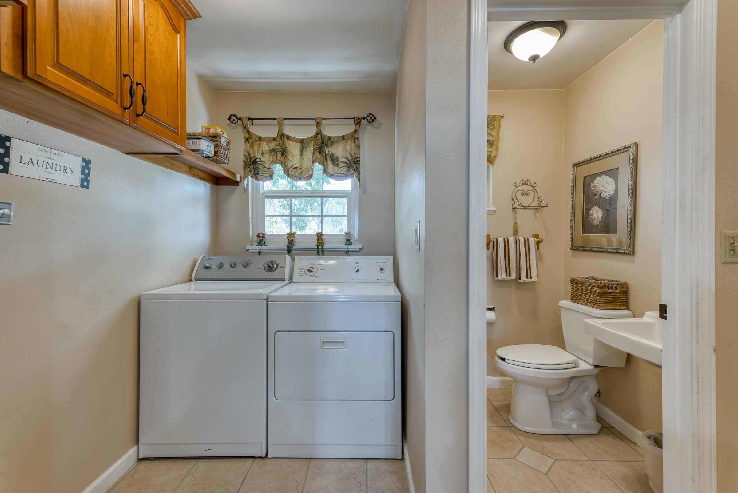 19970 Loafer Way Redding, CA 96002 - Photo 7 of 20 a spacious bathroom with a granite countertop sink a toilet and a shower