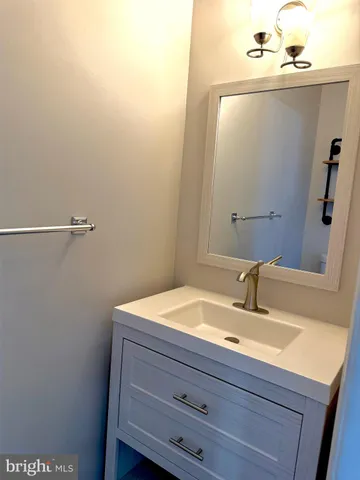 a view of balcony with wooden floor