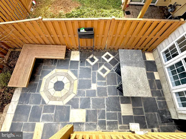 a view of outdoor space with deck and furniture