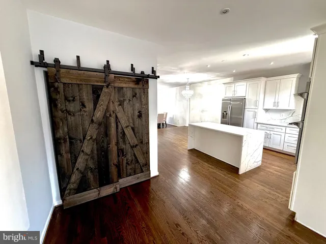 a view of a living room washer and dryer