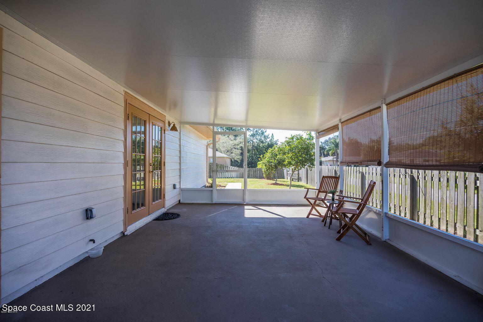 376 Trier Road Northwest Palm Bay, FL 32907 - Photo 12 of 16 a view of an empty room with a balcony