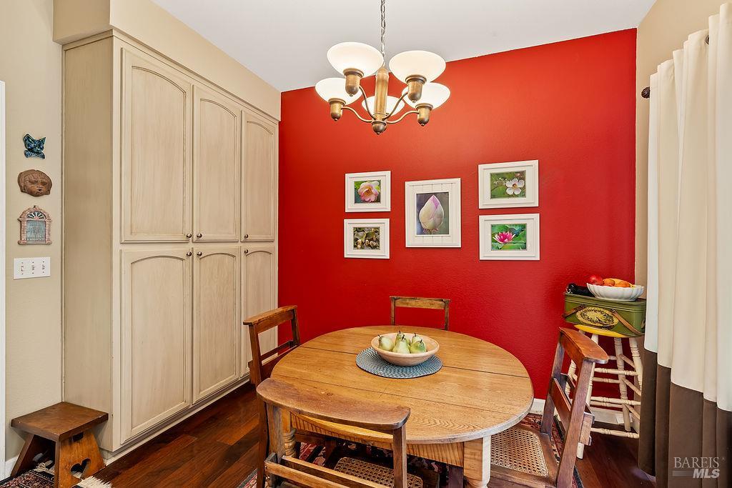 6252 Meadowstone Drive Santa Rosa, CA 95409 - Photo 23 of 33 a view of a dining room with furniture and wooden floor