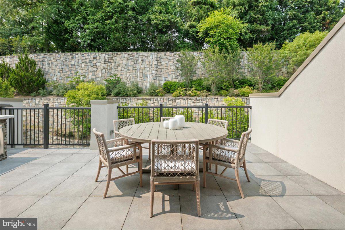 8129 River Road Bethesda, MD 20817 - Photo 56 of 84 a view of a chairs and table in patio