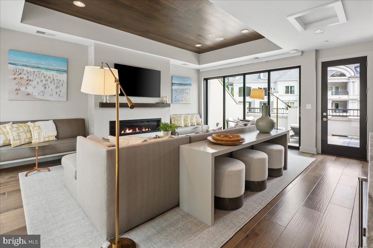 8129 River Road Bethesda, MD 20817 - Photo 59 of 84 a living room with furniture and a flat screen tv