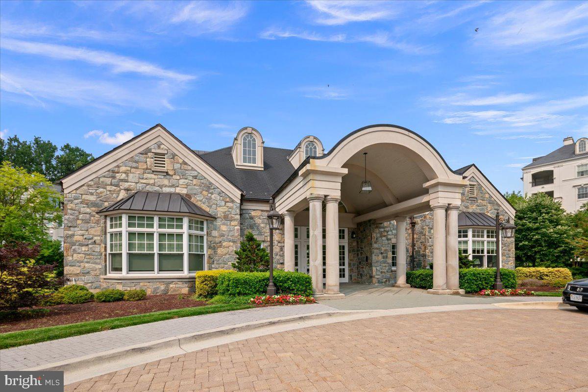 8129 River Road Bethesda, MD 20817 - Photo 70 of 84 a front view of a house with a garden