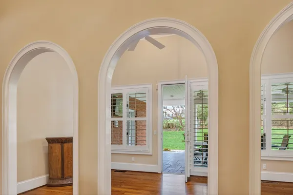 a bathroom with a double vanity sink toilet and shower