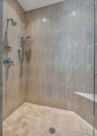 a view of an empty room with a fan