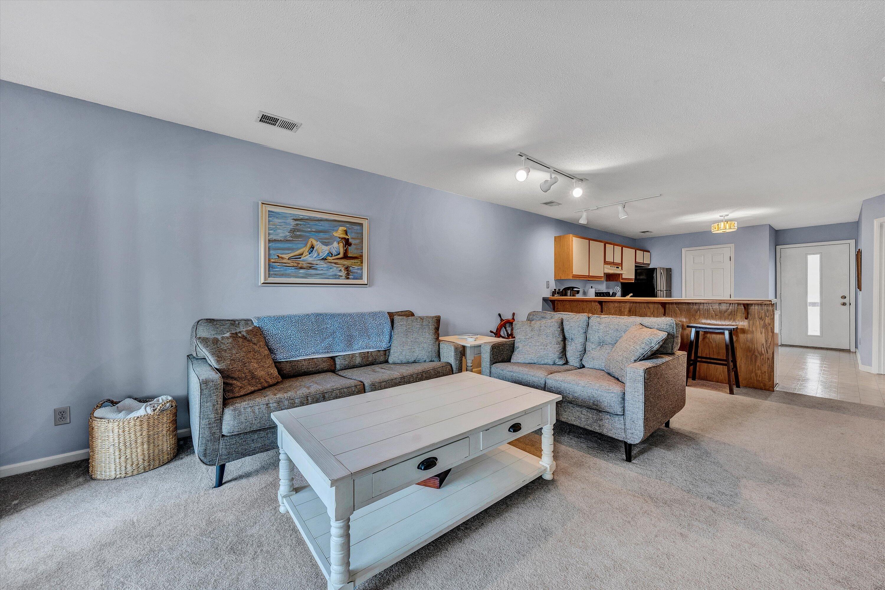 600 Monte Vista Road, Unit 802 Union Hall, VA 24176 - Photo 14 of 32 a living room with furniture and kitchen view
