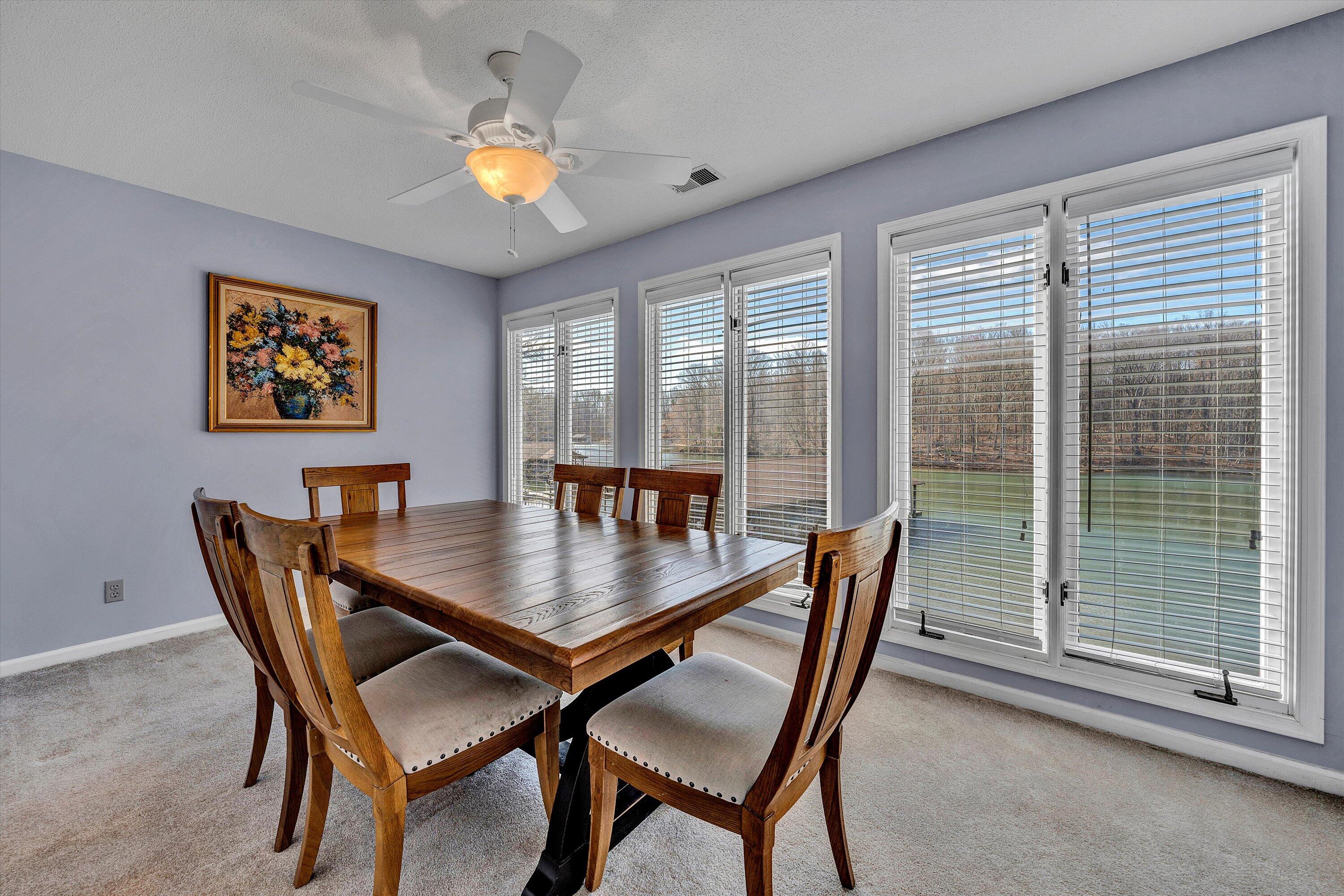 600 Monte Vista Road, Unit 802 Union Hall, VA 24176 - Photo 15 of 32 a view of a dining room with furniture and window