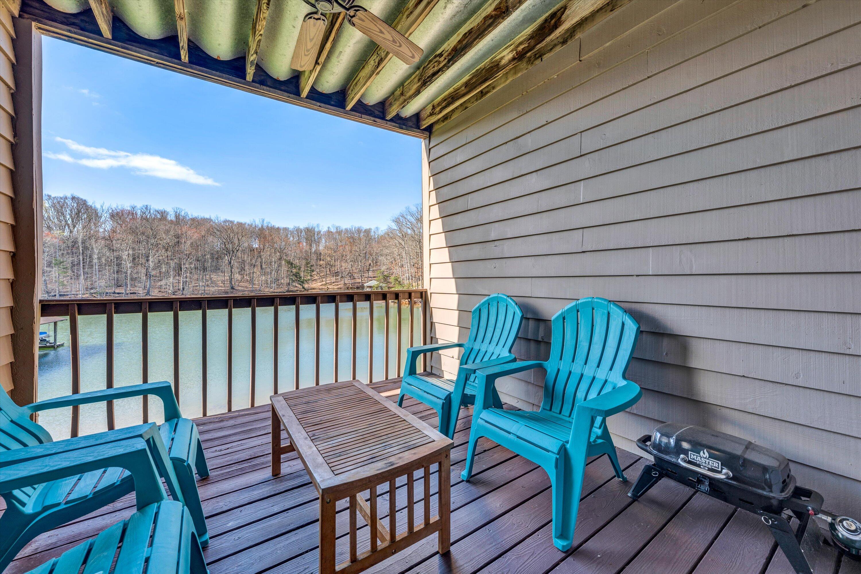 600 Monte Vista Road, Unit 802 Union Hall, VA 24176 - Photo 19 of 32 a view of a deck with wooden floor and outdoor seating