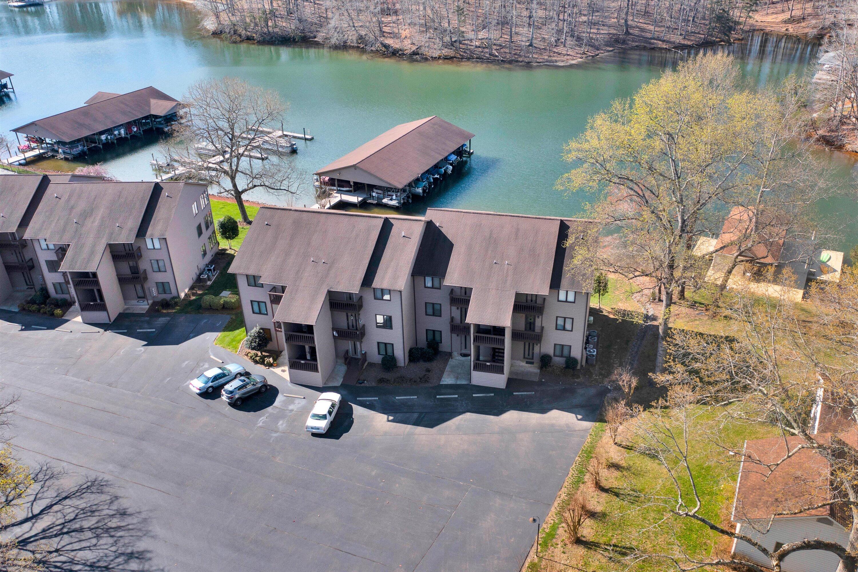 600 Monte Vista Road, Unit 802 Union Hall, VA 24176 - Photo 24 of 32 an aerial view of a house with swimming pool and lake view