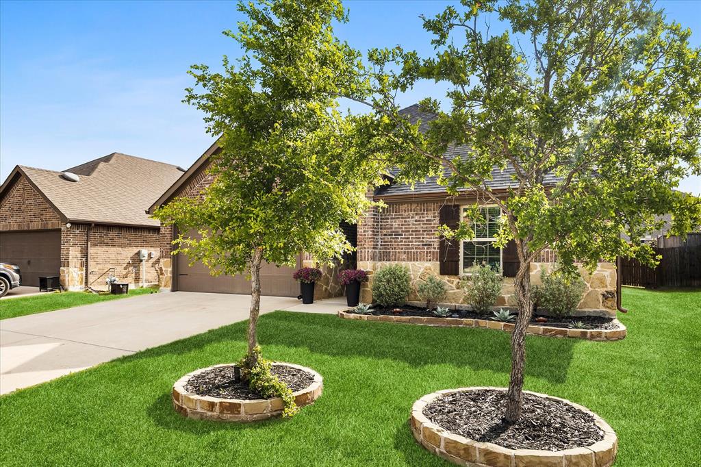 1003 Stage Coach Lane Princeton, TX 75407 - Photo 3 of 26 a view of a patio with a yard