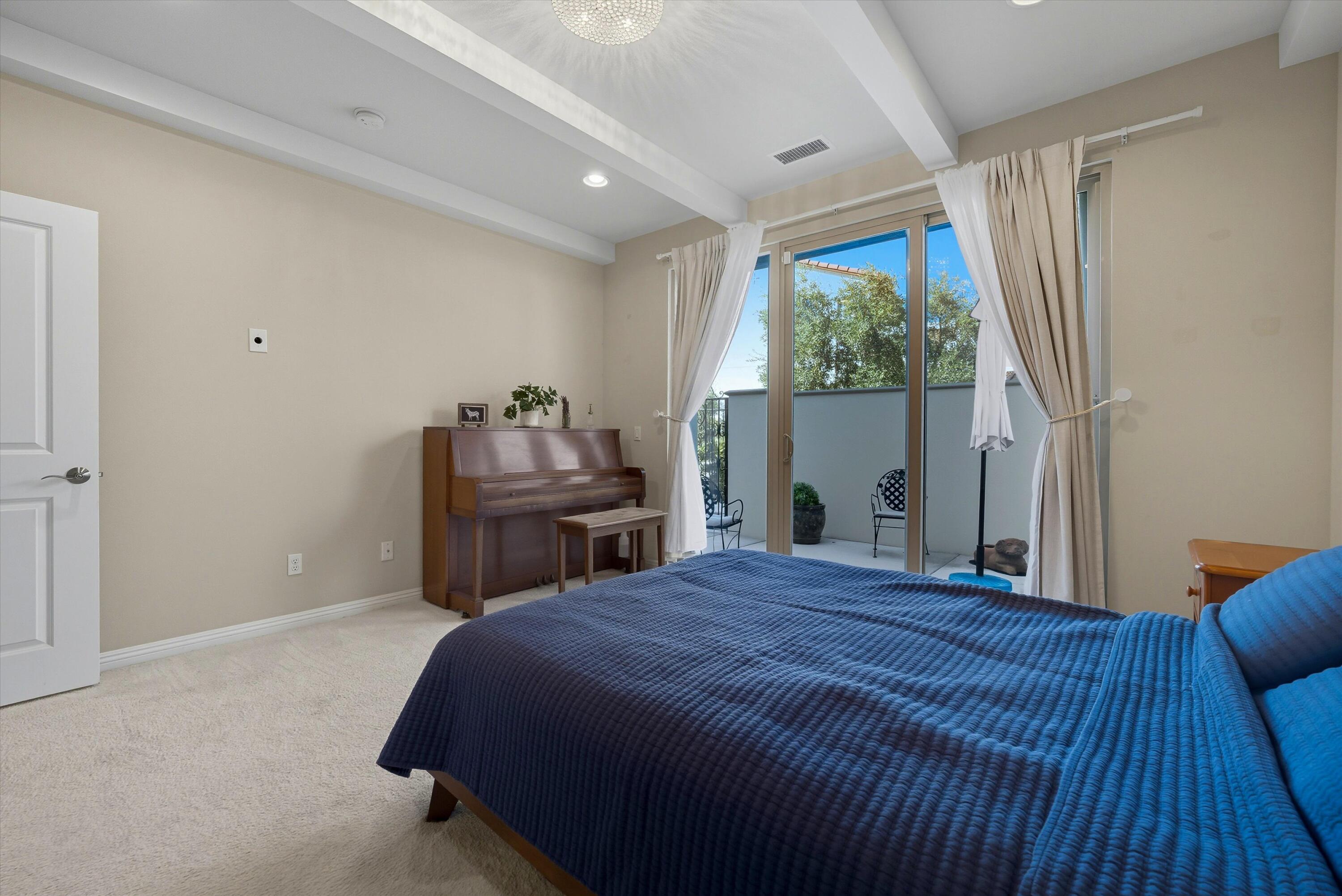 80256 Redstone Way, Unit V93 La Quinta, CA 92253 - Photo 16 of 37 a bedroom with a bed and a window