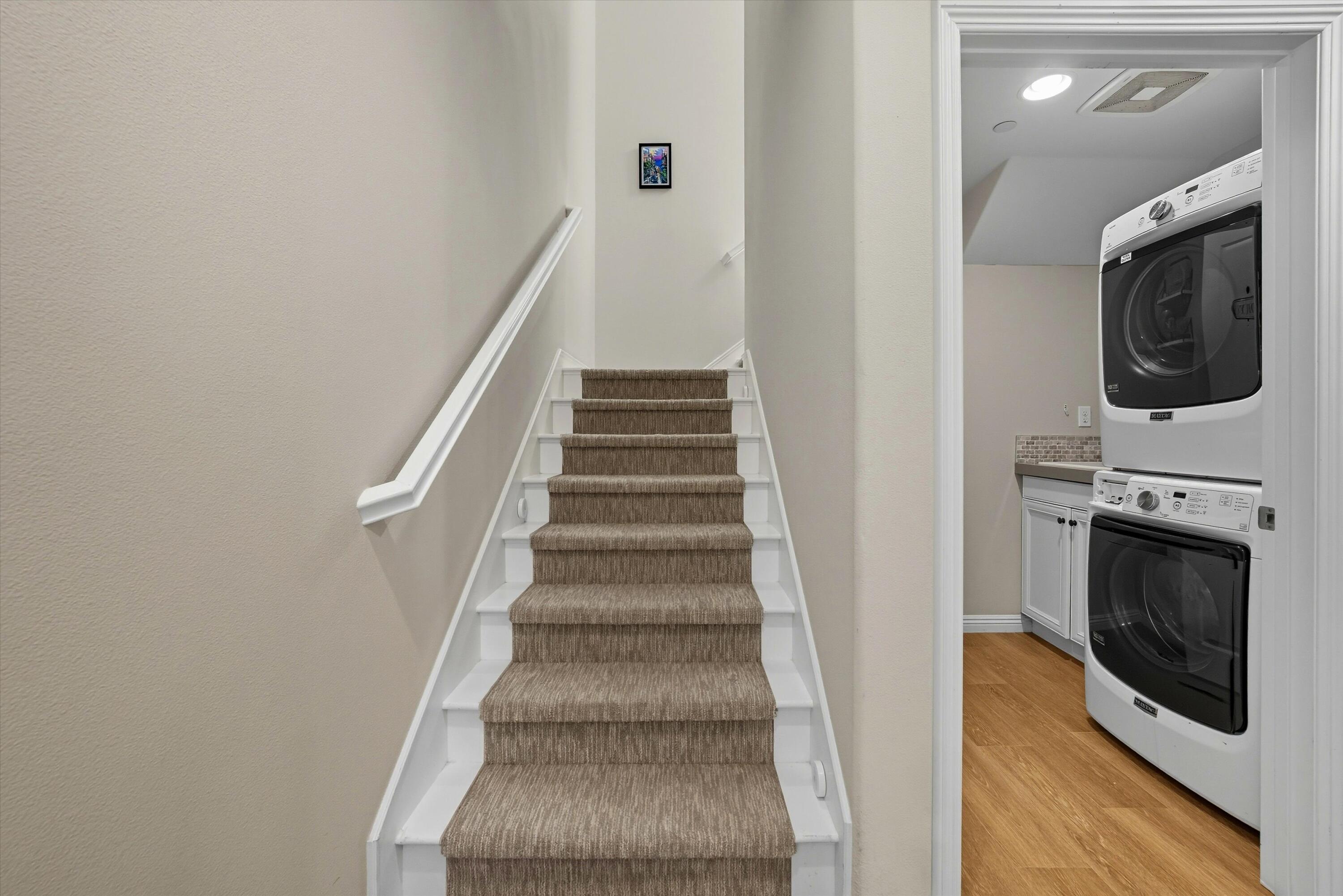 80256 Redstone Way, Unit V93 La Quinta, CA 92253 - Photo 20 of 37 a view of a hallway with fireplace and baby crib