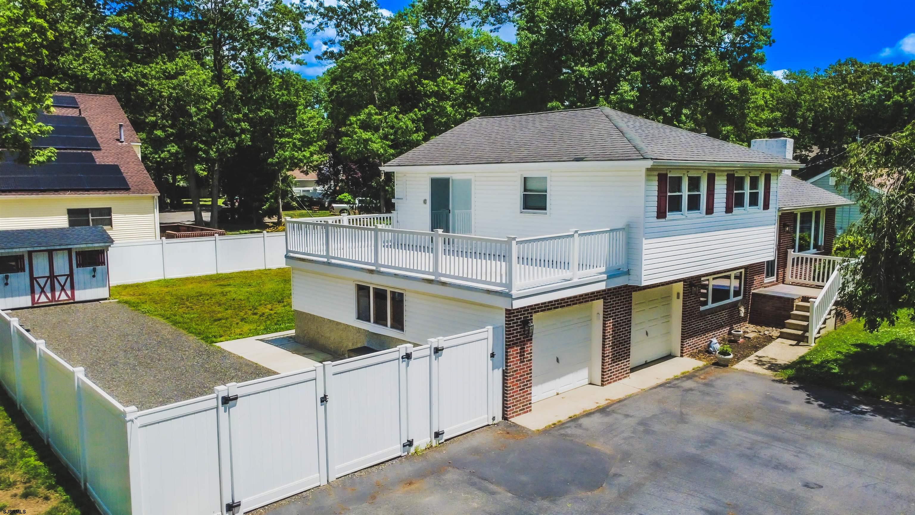 518 Delaware Avenue Absecon, NJ 08201 - Photo 1 of 38 a view of a house with a yard