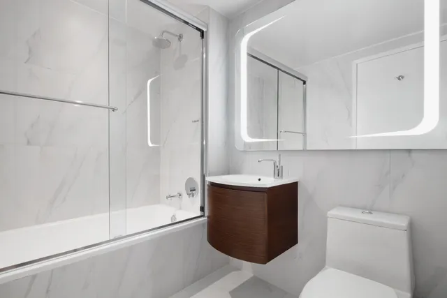 a kitchen with a sink and a microwave