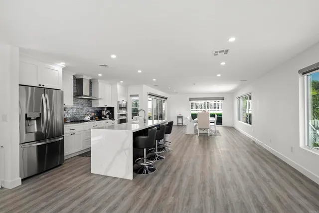 a patio with table and chairs