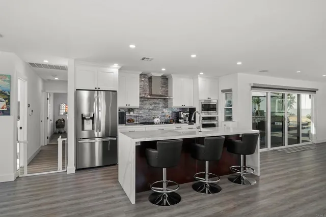 a view of a dining room with furniture window and garden view