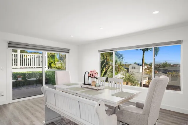 a view of a bedroom with washer and dryer