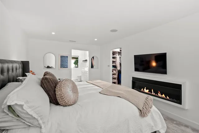 a view of balcony with furniture and a potted plant
