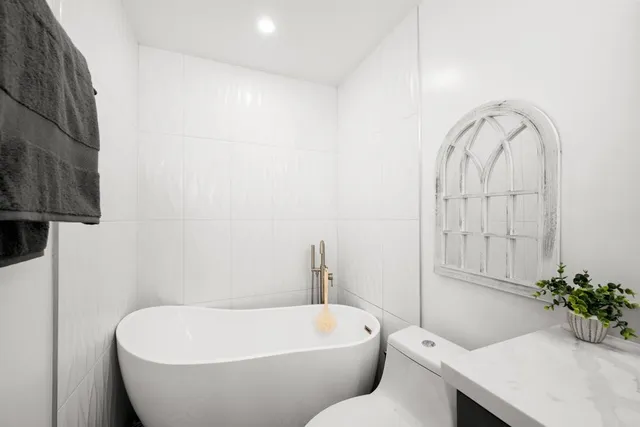 a view of a house with a small yard