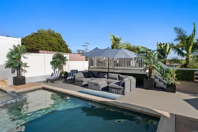a view of a park with palm trees