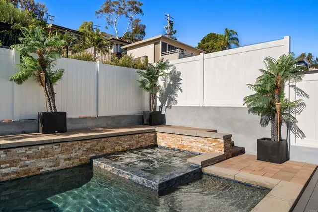 a view of a building with a yard