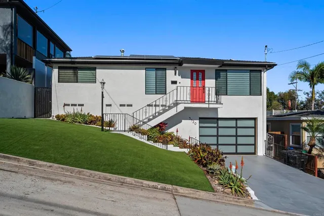 a view of a yard with plants