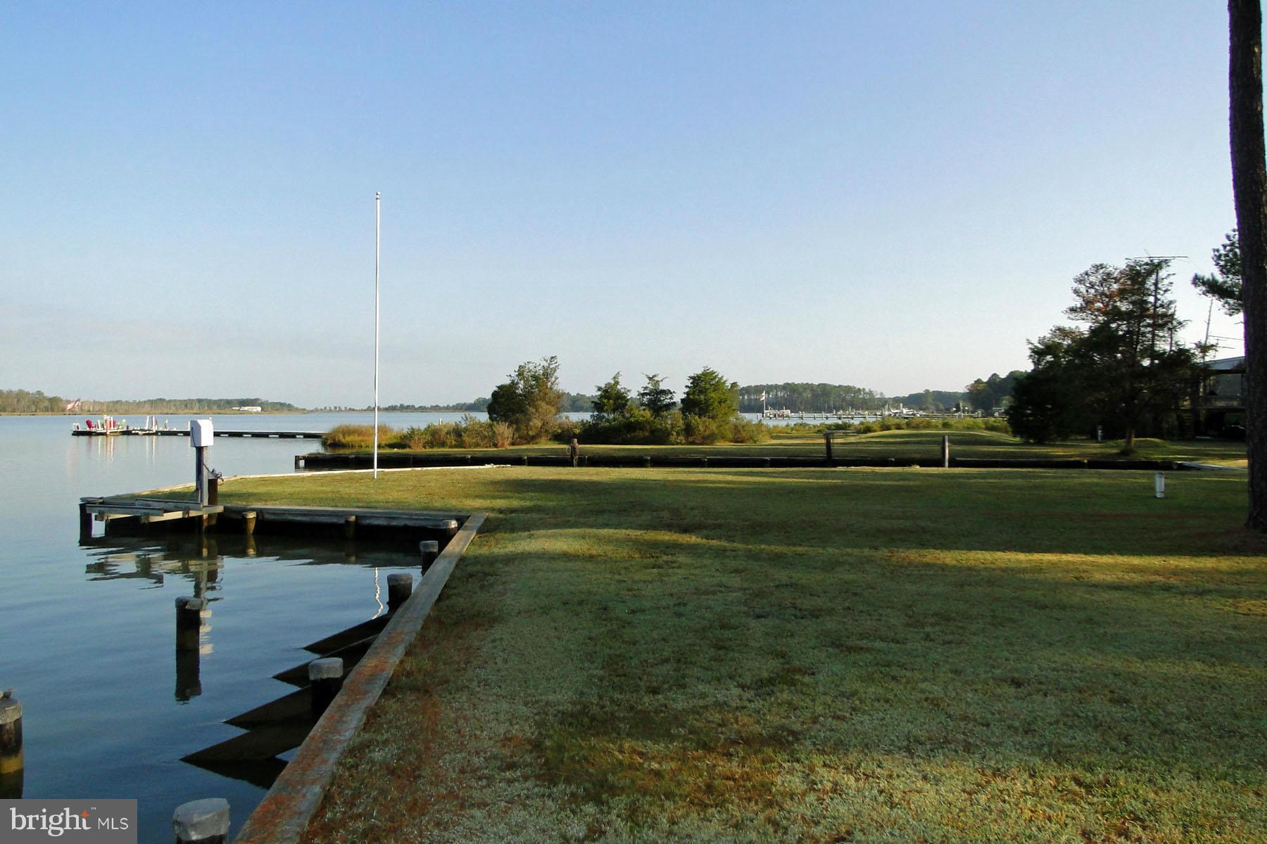 24 Seabreeze Road Cambridge, MD 21613 - Photo 11 of 11 a view of a lake with a yard