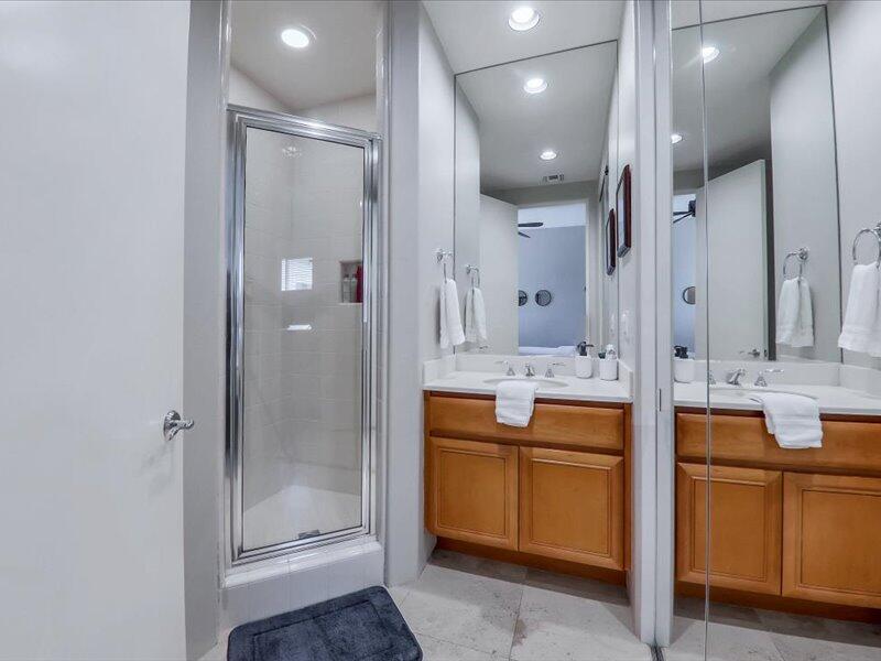 79995 Rancho La Quinta Drive La Quinta, CA 92253 - Photo 30 of 50 a bathroom with a double vanity sink mirror and shower