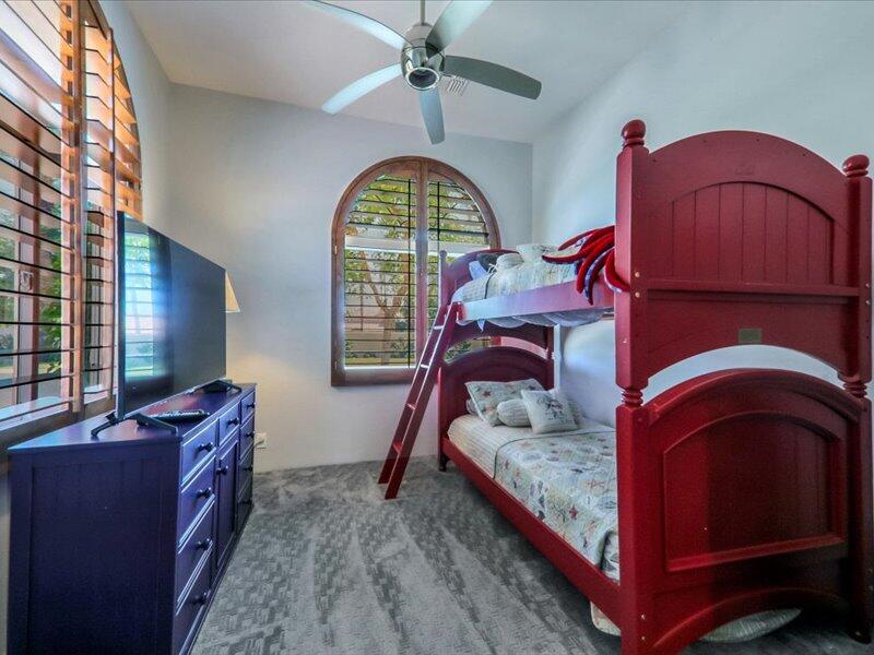 79995 Rancho La Quinta Drive La Quinta, CA 92253 - Photo 34 of 50 a bedroom with a bed and dresser