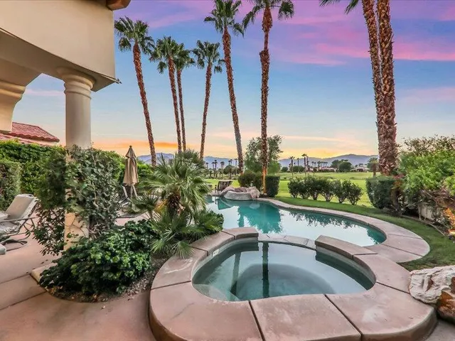 an aerial view of a house with garden