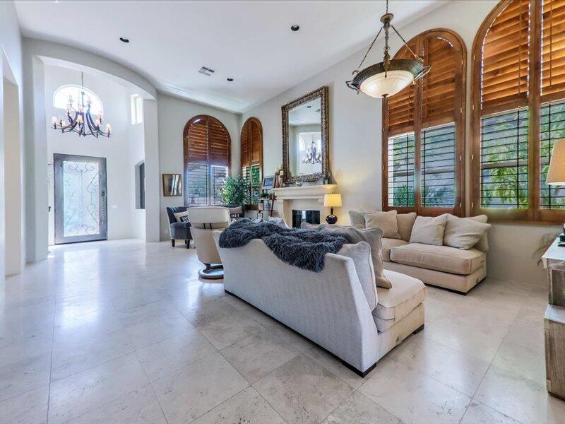 79995 Rancho La Quinta Drive La Quinta, CA 92253 - Photo 7 of 50 a living room with furniture and a large window