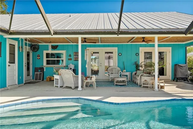 a view of a patio with swimming pool