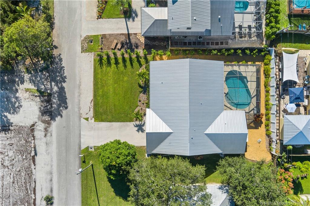 5145 Southeast Matousek Street Stuart, FL 34997 - Photo 38 of 52 an aerial view of a house with outdoor space