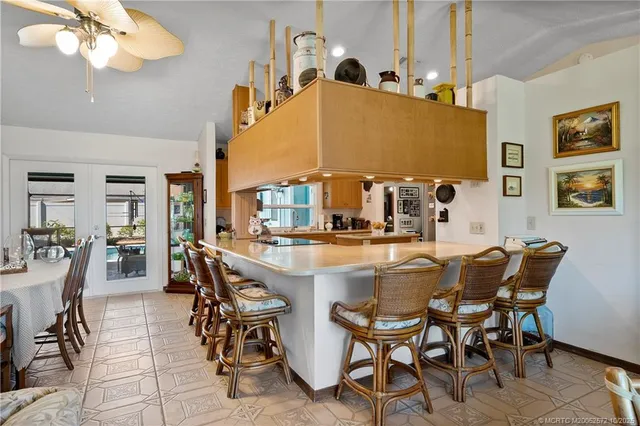 a view of dining table and chairs