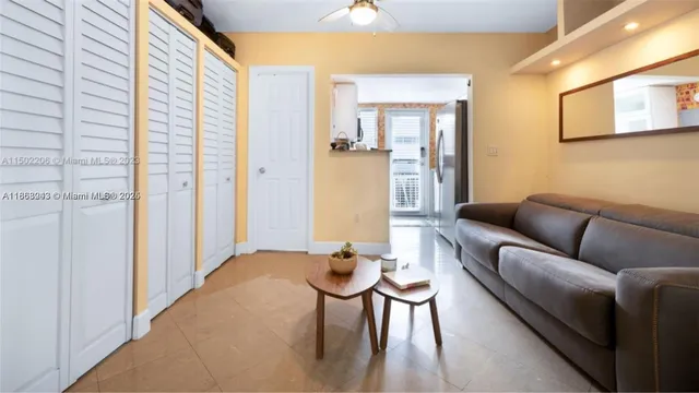 a bedroom with a bed and a table in it