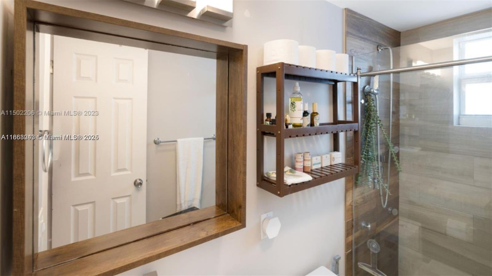 626 Meridian Avenue, Unit 5 Miami Beach, FL 33139 - Photo 16 of 19 a view of a hallway and a dining room with furniture