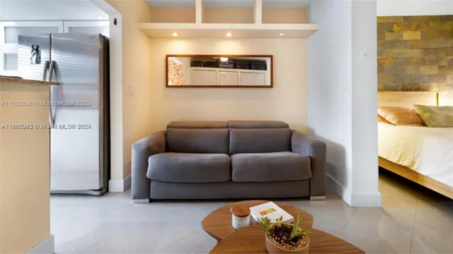 a living room with furniture and a table