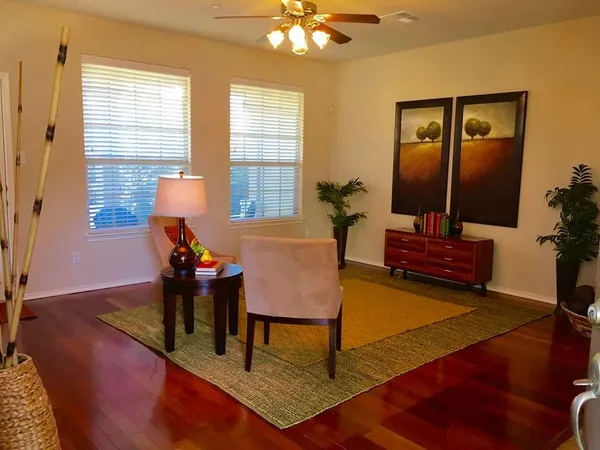 a kitchen with stainless steel appliances granite countertop a refrigerator sink and microwave