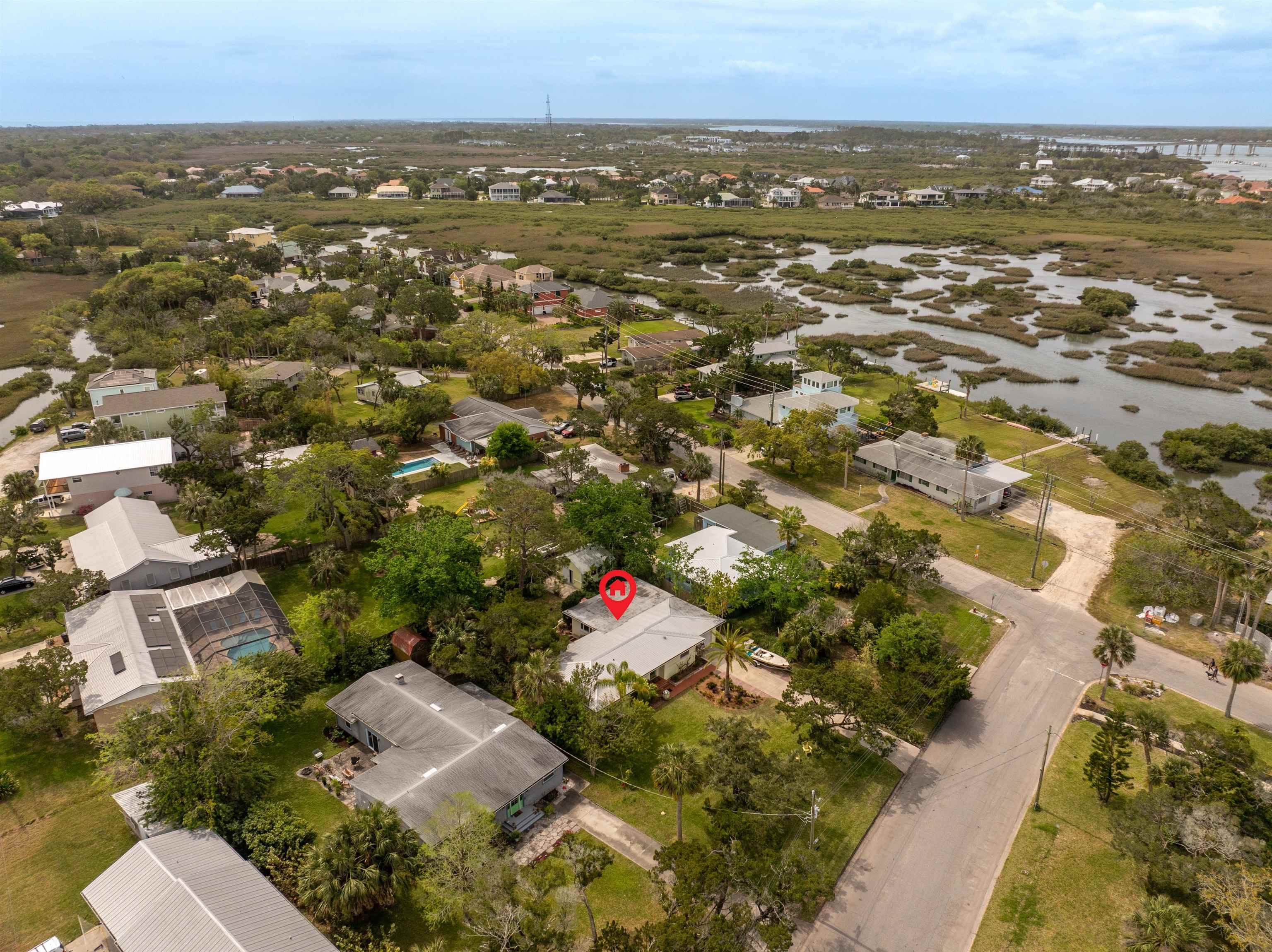 146 Menendez Road St. Augustine, FL 32080 - Photo 33 of 39 an aerial view of residential house with parking and trees