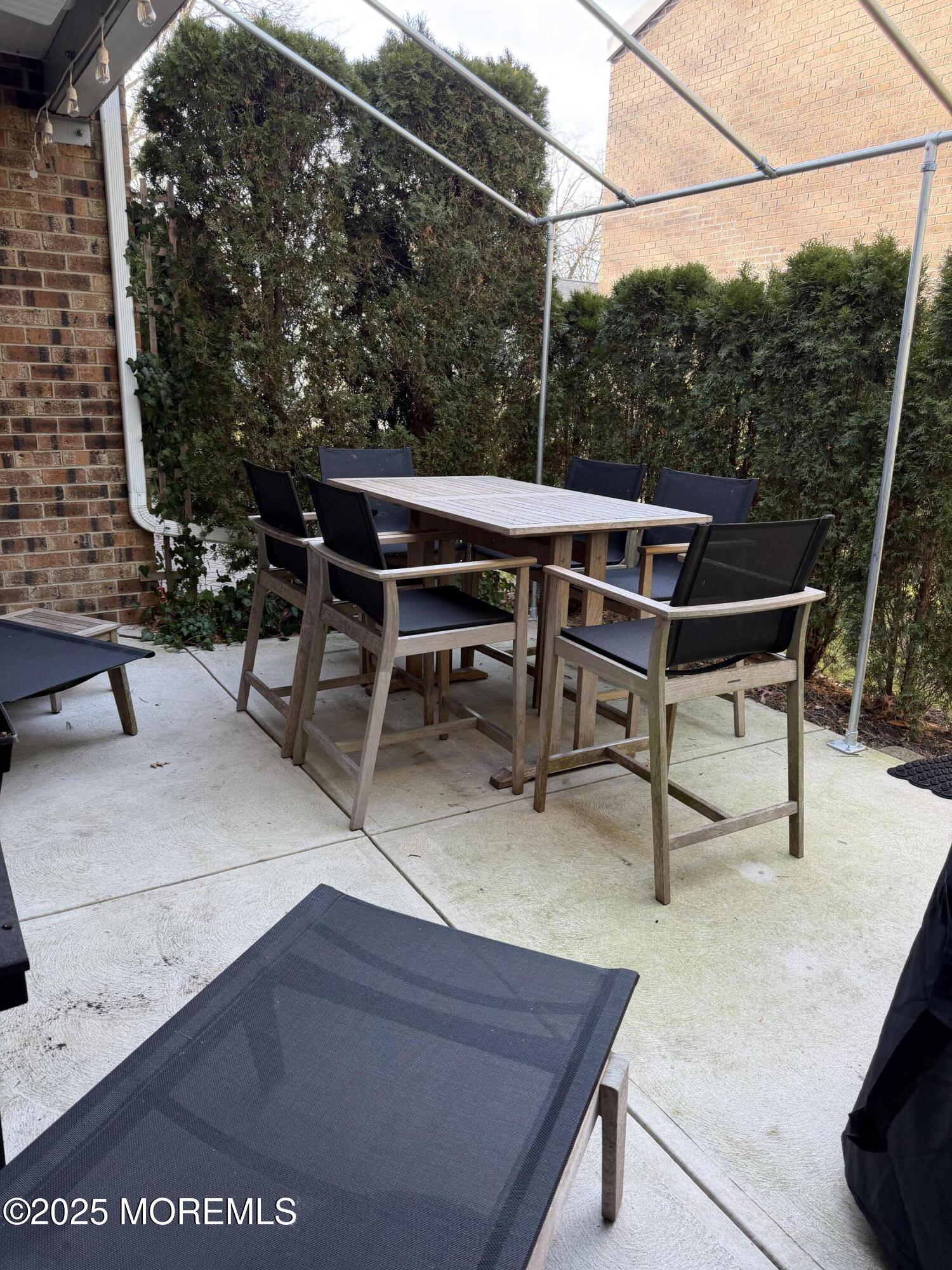 23 Locust Way Spring Lake Heights, NJ 07762 - Photo 26 of 57 a view of a outdoor sitting area with furniture