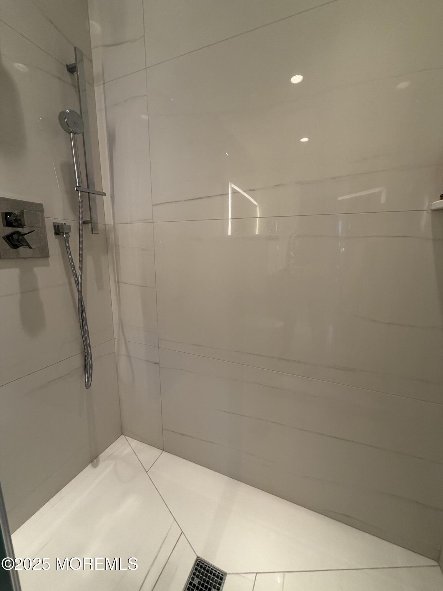 23 Locust Way Spring Lake Heights, NJ 07762 - Photo 40 of 57 a bathroom with a shower