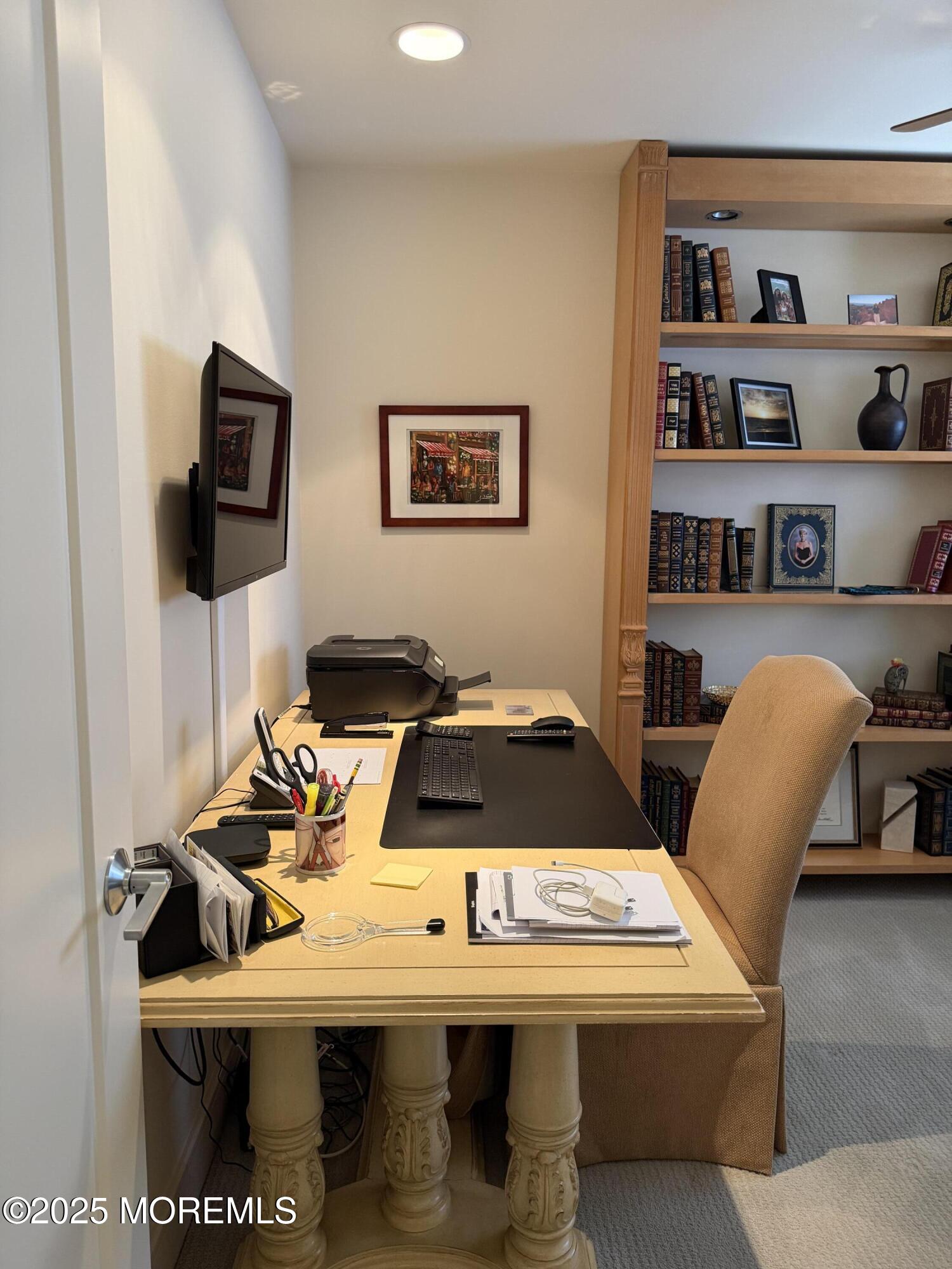 23 Locust Way Spring Lake Heights, NJ 07762 - Photo 45 of 57 a living room with furniture and a flat screen tv