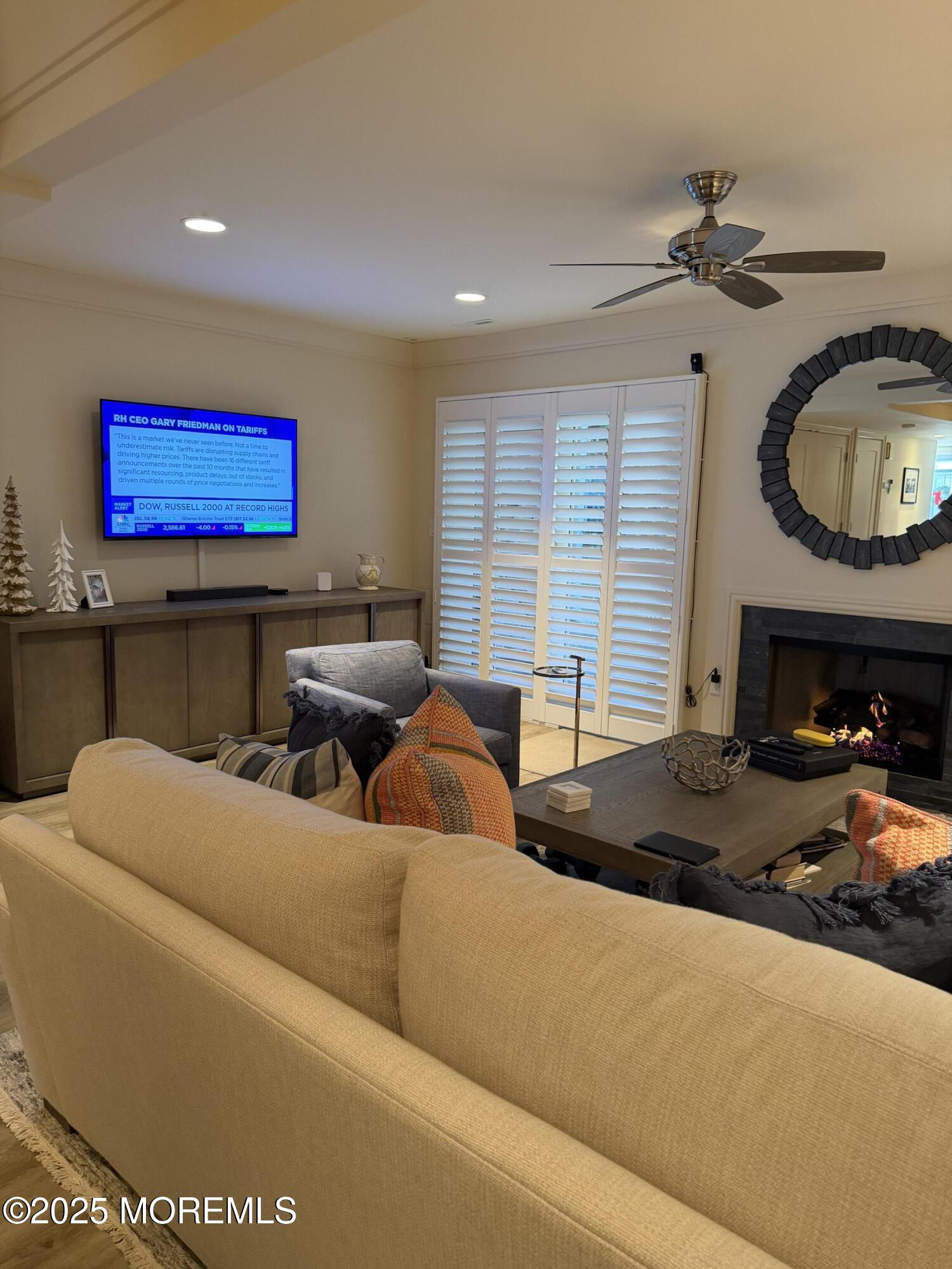 23 Locust Way Spring Lake Heights, NJ 07762 - Photo 6 of 57 a living room with furniture a fireplace and a window